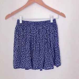 Brandy Melville navy with white floral Mini Skirt